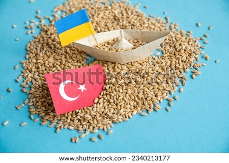 Ukrainian grain wheat, Turkey  flag. Grain deal and problem of blockade of ports, grain corridor, Ukraine Russia conflict. Royalty-Free Stock Photo #2340213177