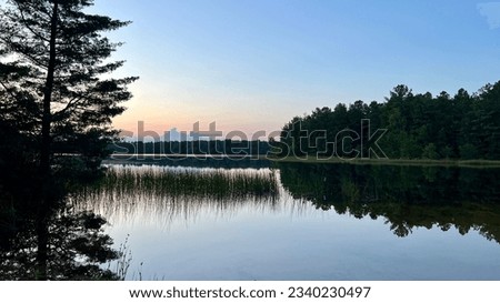 Landscape of a lake at sunset in Bass River State Forest in New Jersey, USA. Royalty-Free Stock Photo #2340230497