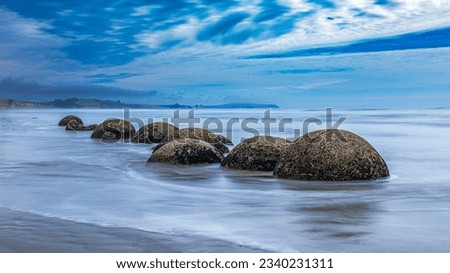 Moeraki boulders with long exposure. Royalty-Free Stock Photo #2340231311