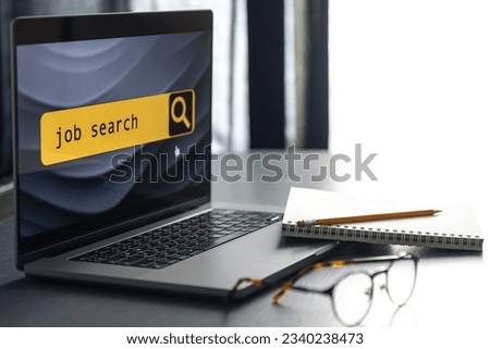 Job search in computer application, website page on laptop screen.