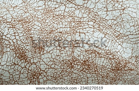 Close up shot of calfskin crackled leather. Wallpaper and background with copy space for text. Royalty-Free Stock Photo #2340270519