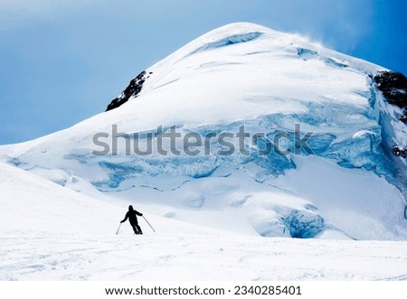 Freerider skier in the Schwarztor Glacier, Monte Rosa. Zermatt, Swiss, Europe.