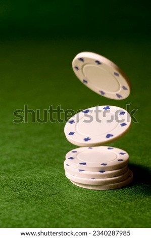 Falling Poker Chips on a games table.