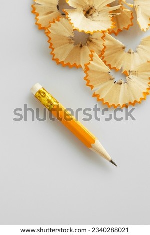 sharpened pencil on white background. High angle view