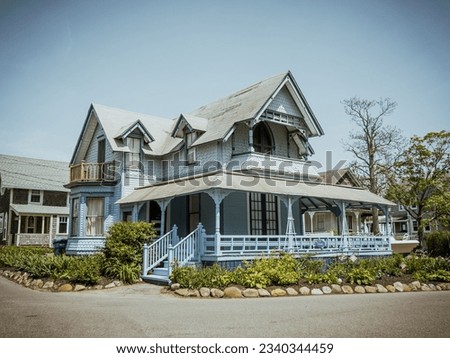 Beautiful colourful gingerbread houses, cottages in Oak Bluffs center, Martha's Vineyard island in Massachusetts USA on a sunny summer day Royalty-Free Stock Photo #2340344459