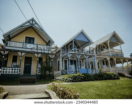 Beautiful colourful gingerbread houses, cottages in Oak Bluffs center, Martha's Vineyard island in Massachusetts USA on a sunny summer day Royalty-Free Stock Photo #2340344485