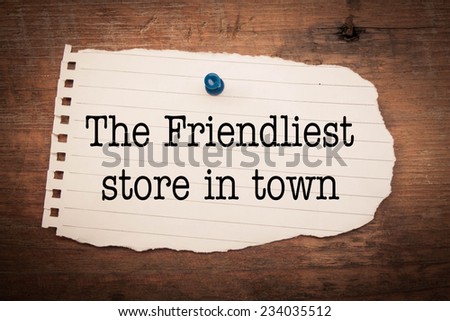 Text the friendliest store in town on the short note texture background