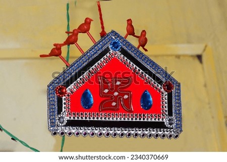 Indian Hindu Wedding Decorative Hanging Toran Image, A Ritual of Hindu Marriage. Traditional Indian culture. When Groom go to Bride's Door touch the Toran.
