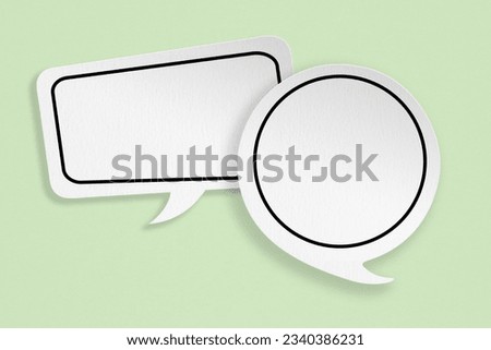 For conceptual image about communication and social media, customer feedback, Blank two white  grunge  paper on rough light green paper texture