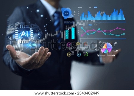 Businessman analyze business investment data from around the world using AI to help gather and summarize data into graph and chart in various form to be easy understand such as line, bar, pie charts Royalty-Free Stock Photo #2340402449