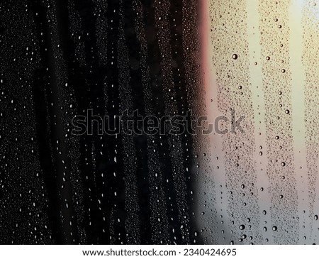 Rainy days,Rain drops on window,rainy weather,concept of autumn weather.