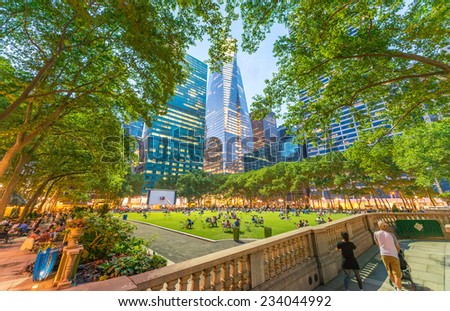 Relaxing in Bryant park after dusk. Manhattan, New York City.