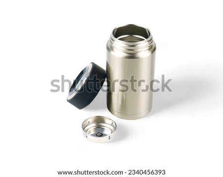 Silver stainless mini thermos on a white background