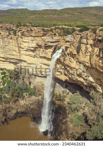 The 90m Nieuwoudtville Falls, a spectacular sight during the rainy season, is situated near the town of Niewoudtville in the Northern Cape Province of South Africa. Royalty-Free Stock Photo #2340462631