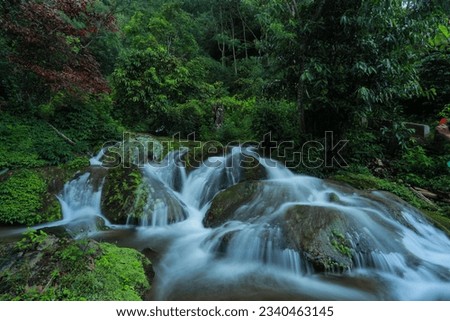 Waterfall in beautiful Mountain Stream