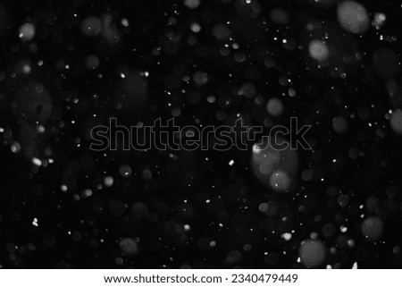 Snow on a black background. Snowflakes overlay. Snow background. Royalty-Free Stock Photo #2340479449