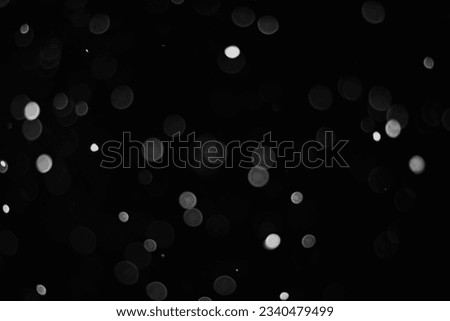 Snow on a black background. Snowflakes overlay. Snow background.