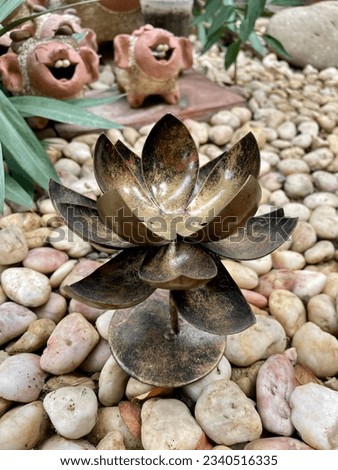 The Iron Lotus conveys strength in a gentle way. Means gentle but not weak. Royalty-Free Stock Photo #2340516335