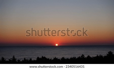 Sunrise at Gangneung East Sea Royalty-Free Stock Photo #2340516431