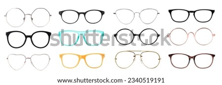 Set with different eyeglasses isolated on white Royalty-Free Stock Photo #2340519191