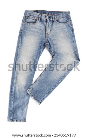 Blue jeans isolated on white, top view. Stylish clothes Royalty-Free Stock Photo #2340519199