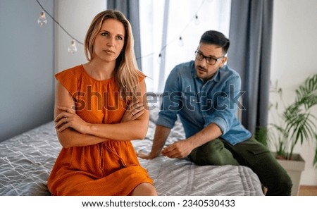 Frustrated young couple arguing and having marriage problems. Divorce conflict people concept Royalty-Free Stock Photo #2340530433