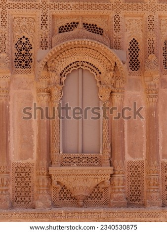 Beautiful, intricately patterned stucco window, Jodhpur, northern India. High quality photo Royalty-Free Stock Photo #2340530875