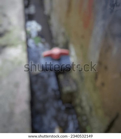 Defocused abstract background of pond outlet