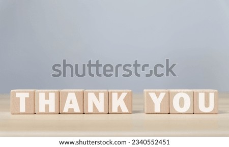 Wooden block showing a message, the word thank you. Letter writing concept. Congratulations, Appreciation, with Copy Space
