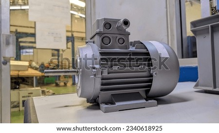 An electromotor in gray color, the driving motor Royalty-Free Stock Photo #2340618925