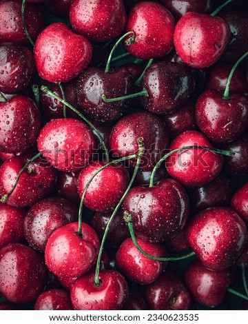 Close-up of ripe fresh red cherries. Cherry background Royalty-Free Stock Photo #2340623535