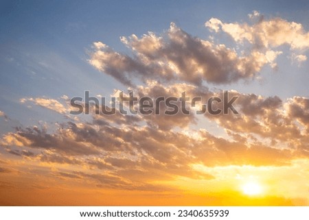 Sky and cloudscape at sunset. Nature scene background. Royalty-Free Stock Photo #2340635939