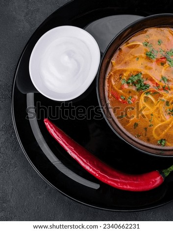 Chicken soup with noodles top view