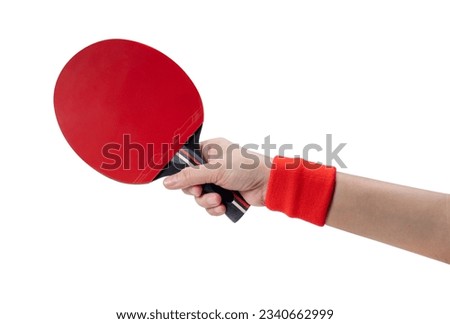 Sports equipment, Woman Hand holding Red ping pong racket on white background or Black table tennis racket isolate on white with clipping path. Royalty-Free Stock Photo #2340662999
