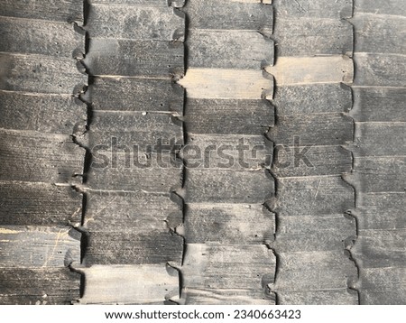 Antique wooden tiles. Old gray wood shingles. Rough wooden surface background. 