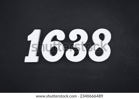 Black for the background. The number 1638 is made of white painted wood.