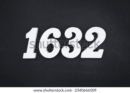 Black for the background. The number 1632 is made of white painted wood.