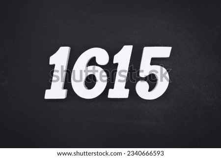 Black for the background. The number 1615 is made of white painted wood.