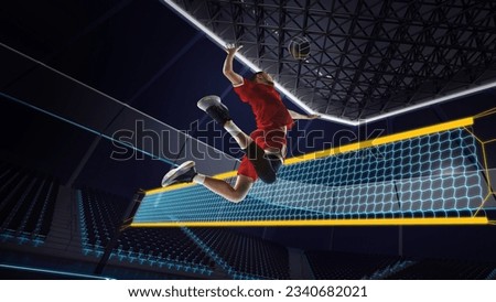 Bottom view, dynamic image of young man, volleyball player in motion, during game hitting ball. 3D arena, court. Concept of competition, professional sport, active lifestyle, hobby, motivation. Royalty-Free Stock Photo #2340682021