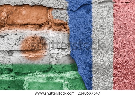 Niger and France. French and Nigerian flag. Flags of countries on background of brick wall. Street art. Diplomacy and international relations. Embassy and consulate. Royalty-Free Stock Photo #2340697647
