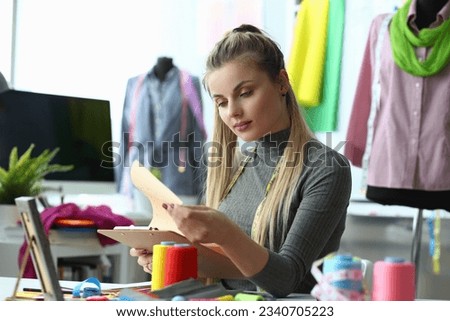 Fashion designer is working on a color design in studio