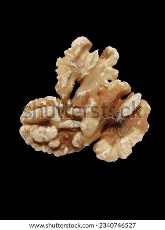 Pealed Roasted Walnuts Picture with Black Background