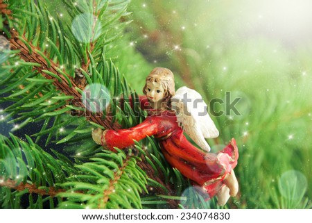 Little angel on Christmas tree.