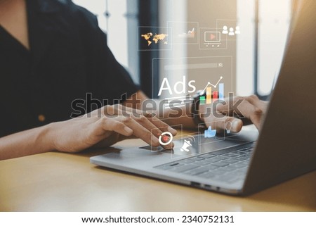 Digital marketing concept, Young man using laptop with Ads dashboard digital marketing strategy analysis for branding.