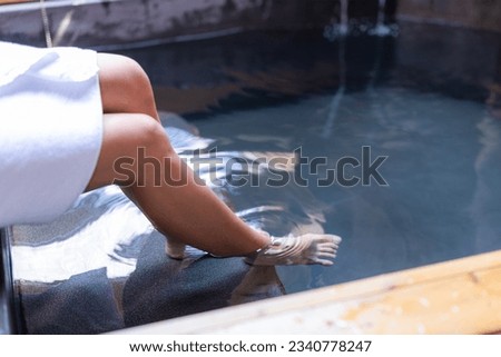 Woman enjoy onsen at hotel Royalty-Free Stock Photo #2340778247