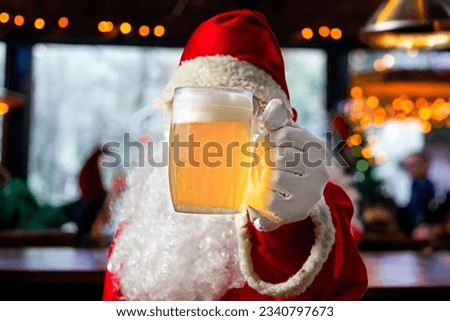 Santa Claus drinking beer in the bar