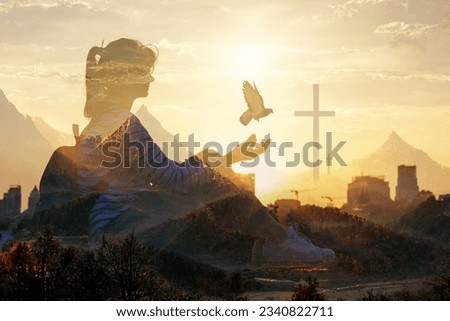 The concept of spiritual fulfillment and hope. Double exposure of a woman against the background of the city and the Cross and a flying bird.