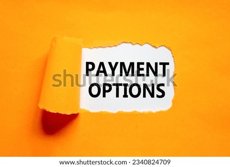 Payment options symbol. Concept words Payment options on beautiful white paper. Beautiful orange background. Business payment options concept. Copy space.