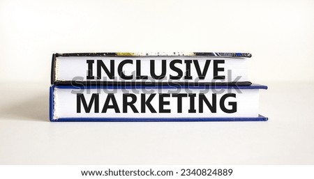 Inclusive marketing symbol. Concept words Inclusive marketing on beautiful books. Beautiful white table white background. Business inclusive marketing concept. Copy space.