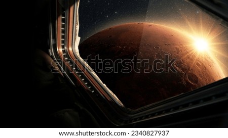 Spaceship flies near the amazing red planet Mars, view from the window. Travel and tourists in space, concept. Beautiful space view of the Mars with sunset. Hotel in space Royalty-Free Stock Photo #2340827937